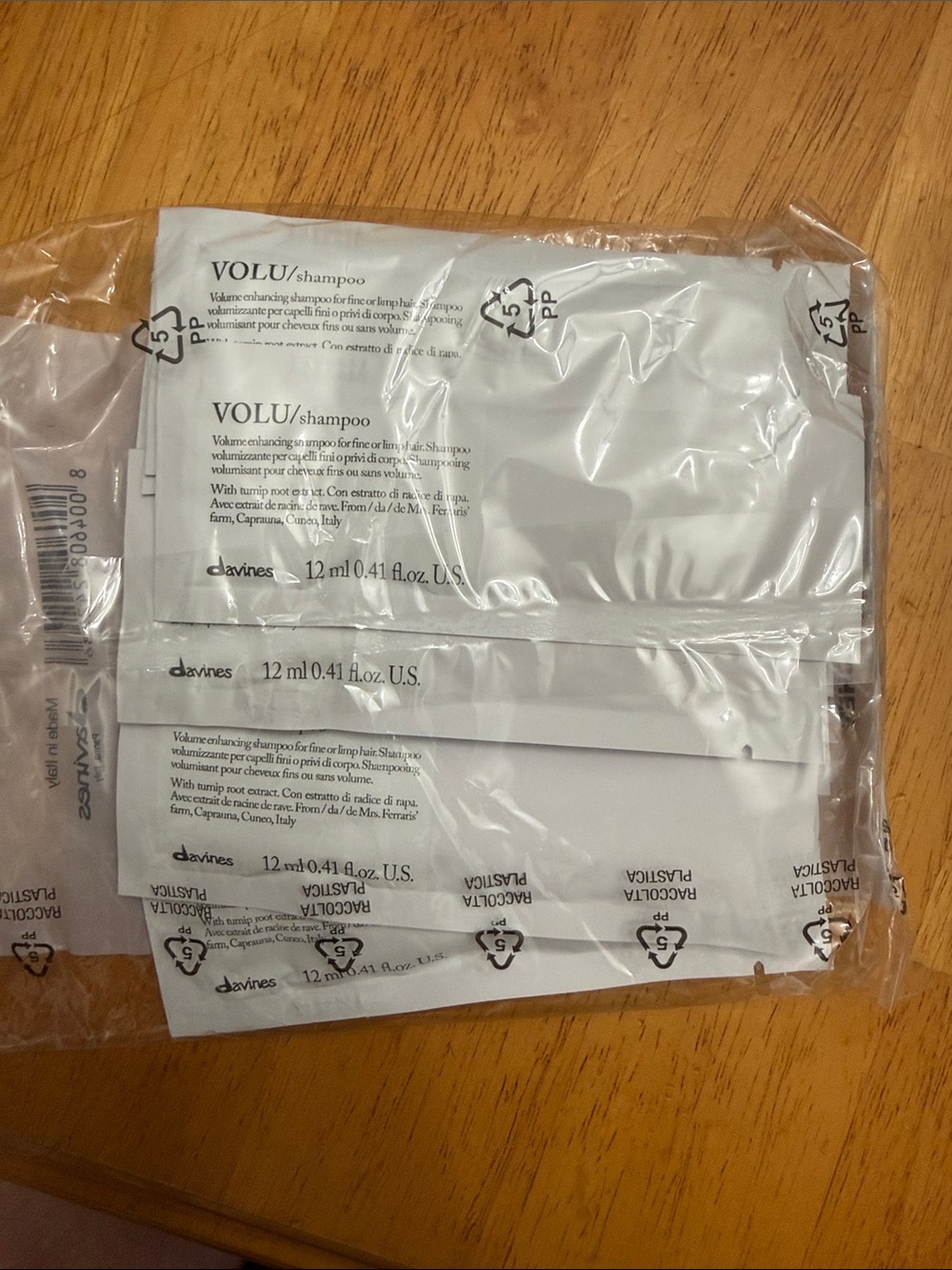 12 Davines VOLU/ Shampoo Sachet Pack — White and Black Text